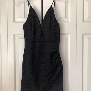 Black deep V neck dress. Brand new with tags